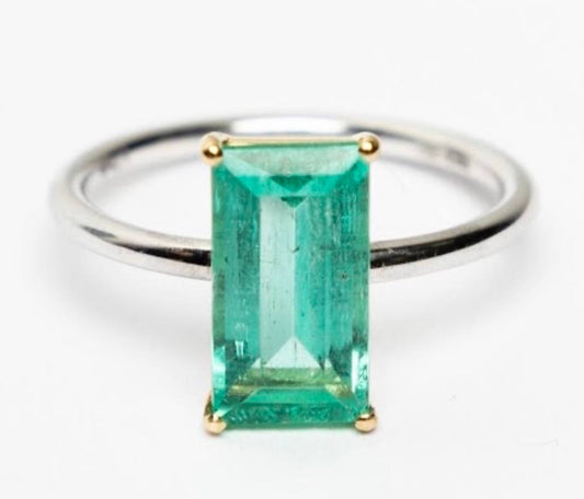 a ring with green gemstone